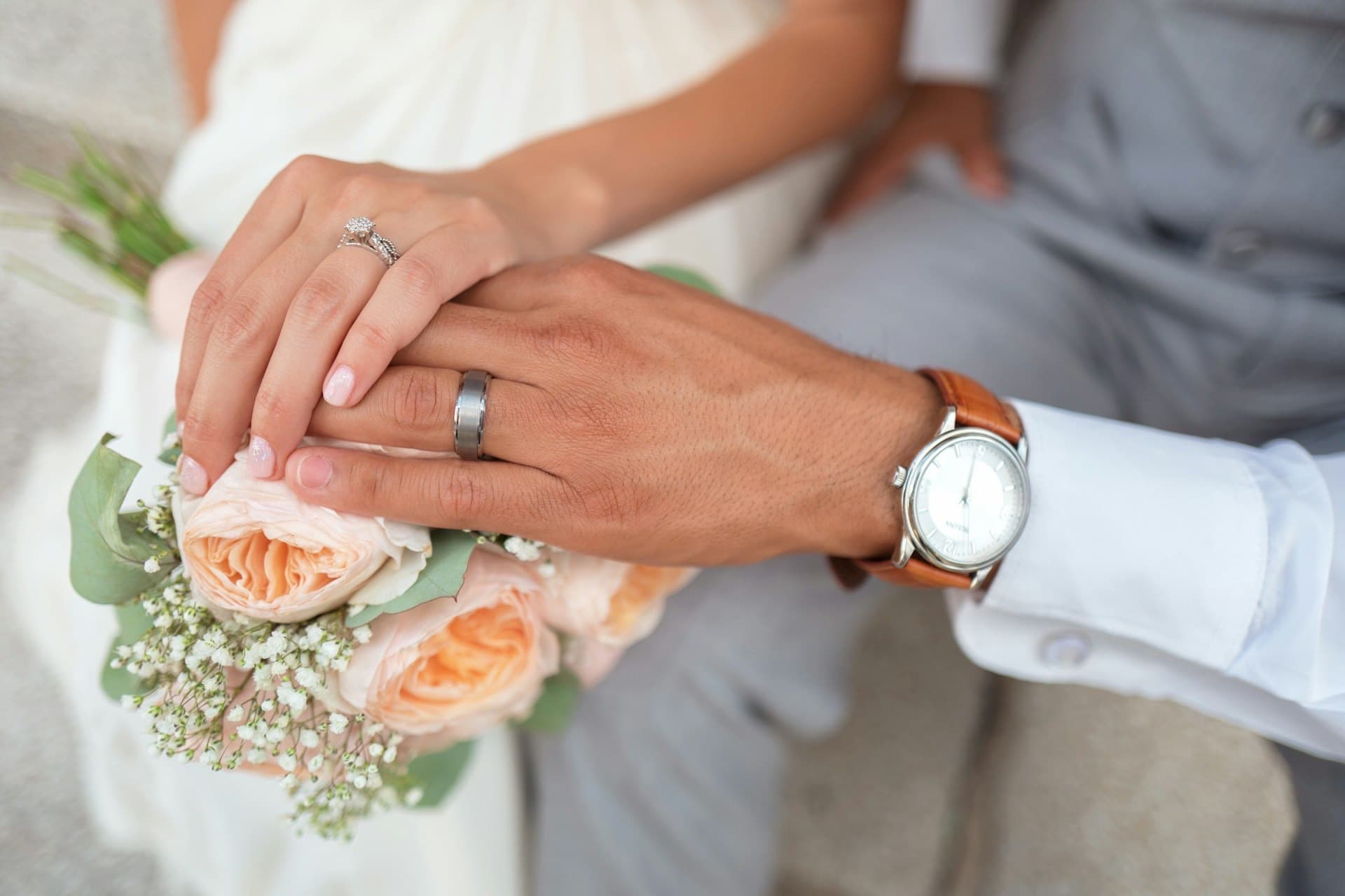 Wedding rings and bouquet