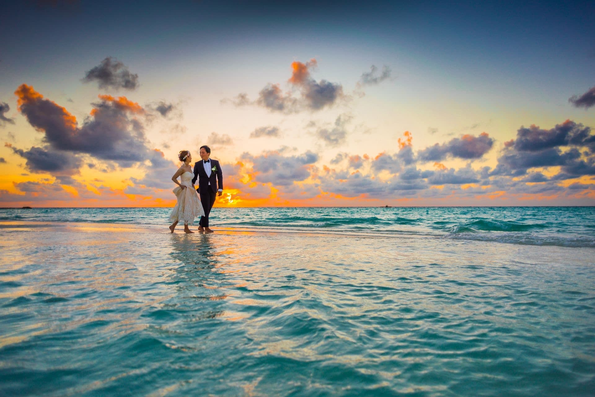 Couple at their Cyprus wedding ceremony by the sea